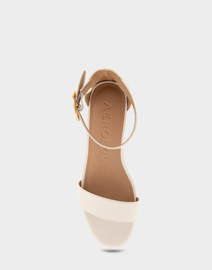 Aerosoles Ankle Strap Mid Wedge Sandal in Eggnog Faux Leather